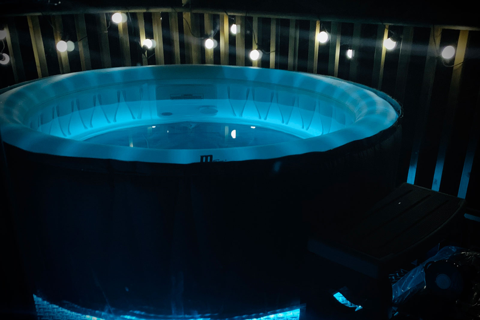hot tub at night with blue led lights